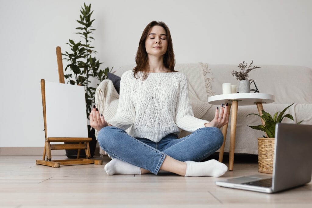 female meditating indoor portrait